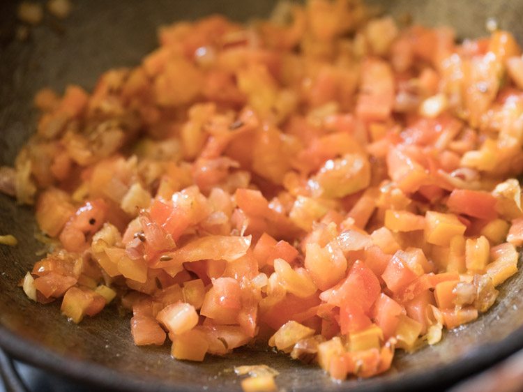 early stage of tomato onion masala 