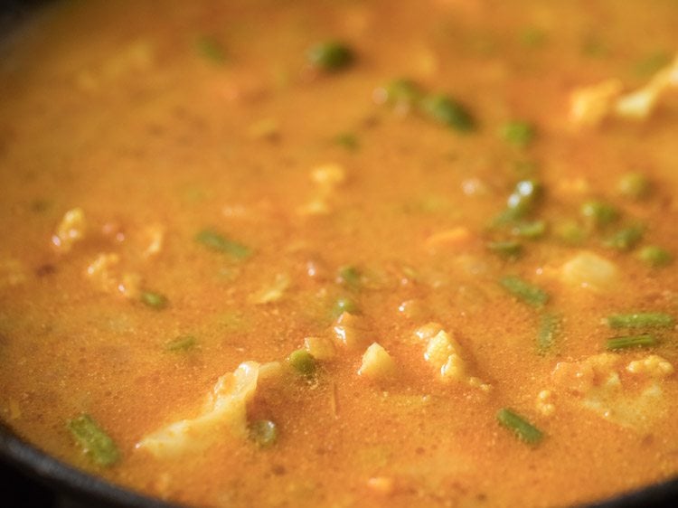 mixed veggie curry simmering on low heat