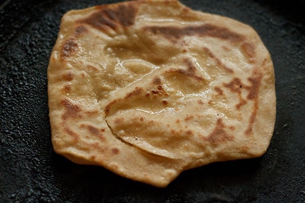 flip and roast paratha on tawa