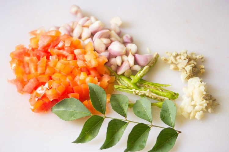 chopping other ingredients for vellapayar curry