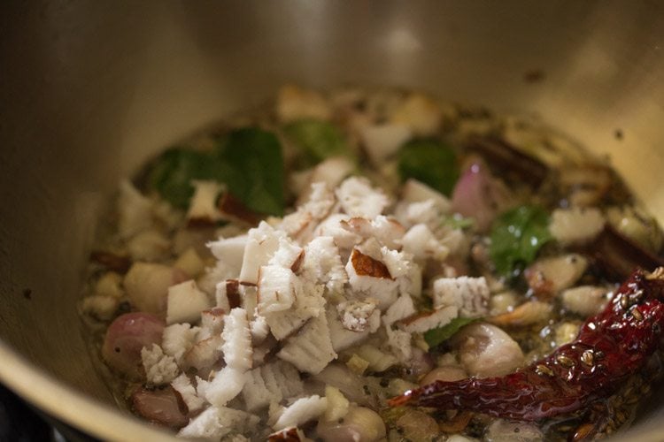 adding chopped fresh coconut 