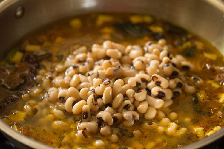 adding cooked black eyed beans 