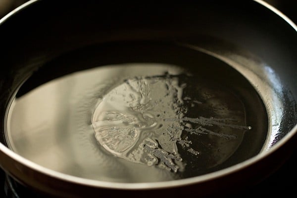 heating oil in pan.