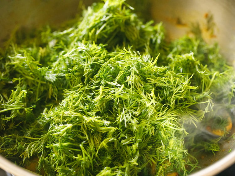 adding dill leaves to potatoes