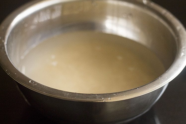 rice soaked in water in a bowl