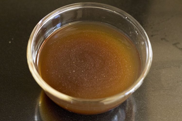 jaggery soaked in water in a bowl