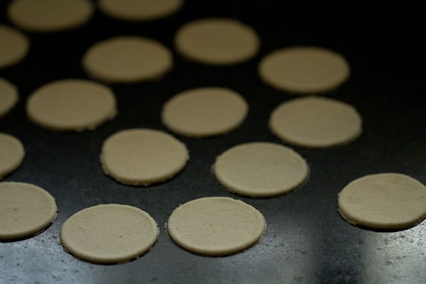 cut puri dough placed on a plate