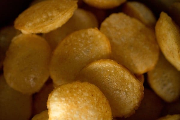 fried puri in a storage box