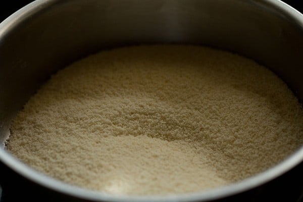 mixing all purpose flour with rava mixture