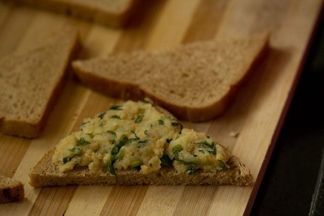 potato stuffing spread on bread triangle