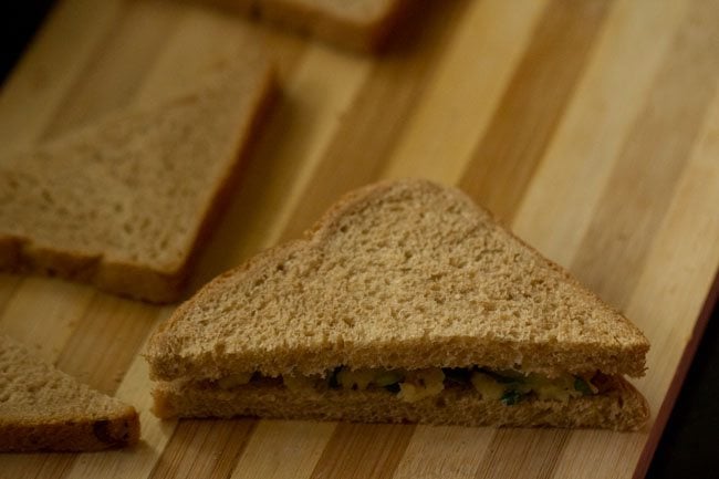 bread slice on top to make a bread sandwich for pakora
