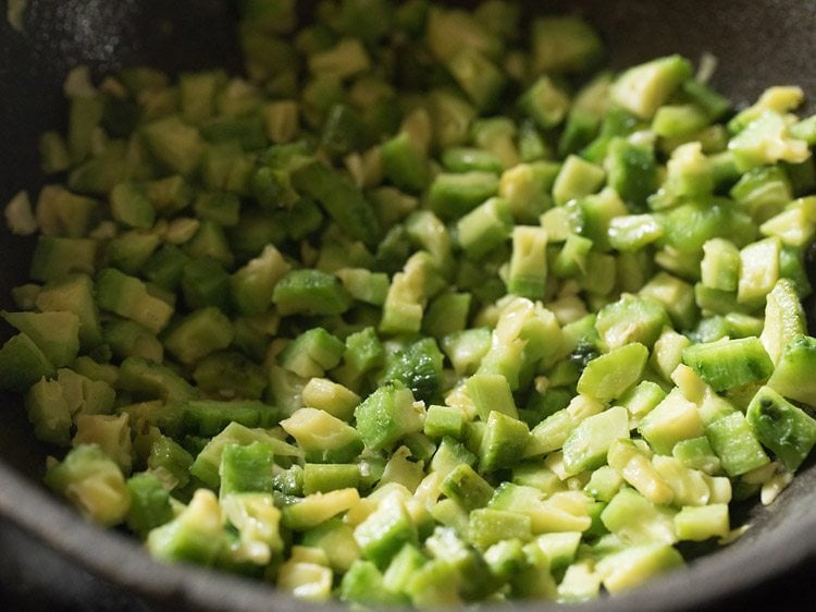 Sauté the karela for 4 to 5 minutes.