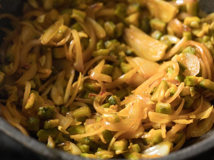 adding some water continue to cook the sabji