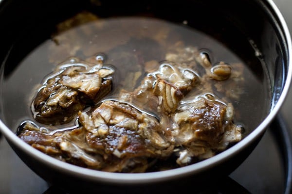 tamarind, dates and water in a pan