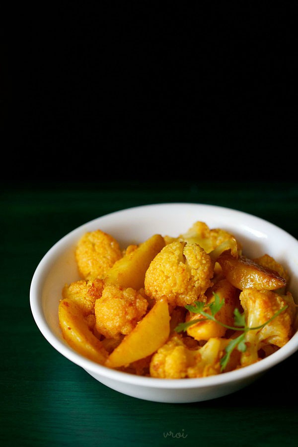 aloo gobi served on a white bowl