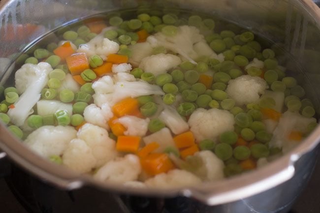 cooked veggies in cooker