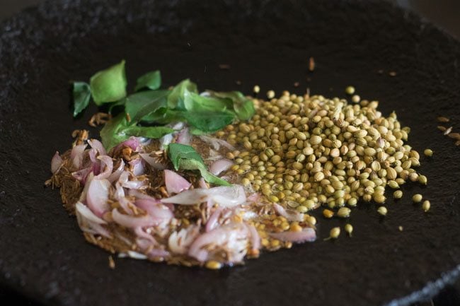 curry leaves and coriander seeds added on tava