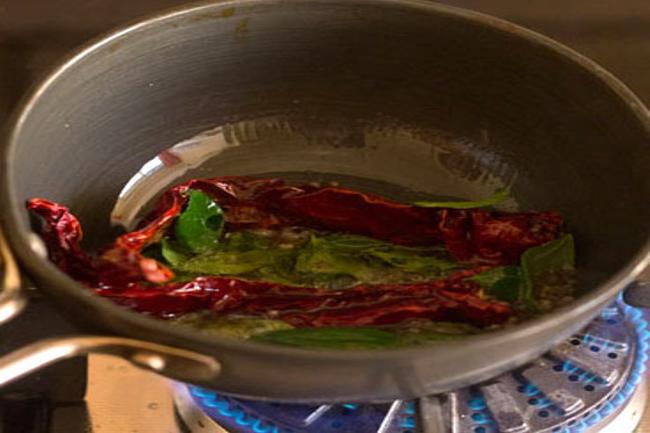 frying red chilies and curry leaves