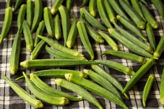 drying bhindi on a kitchen napkin. 