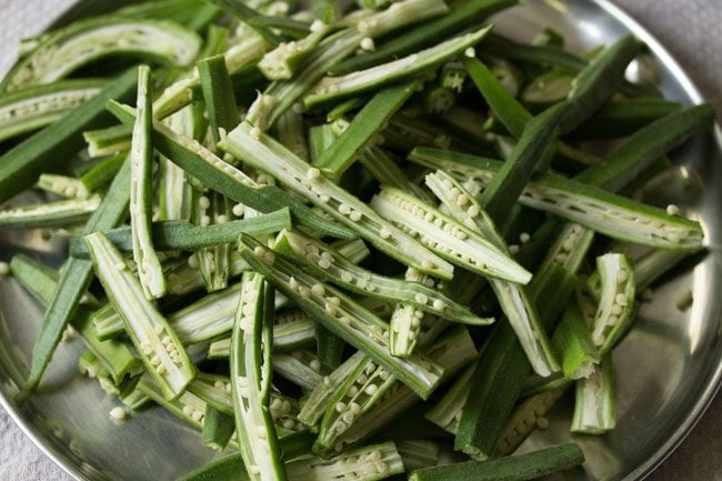 sliced bhindi on a plate. 