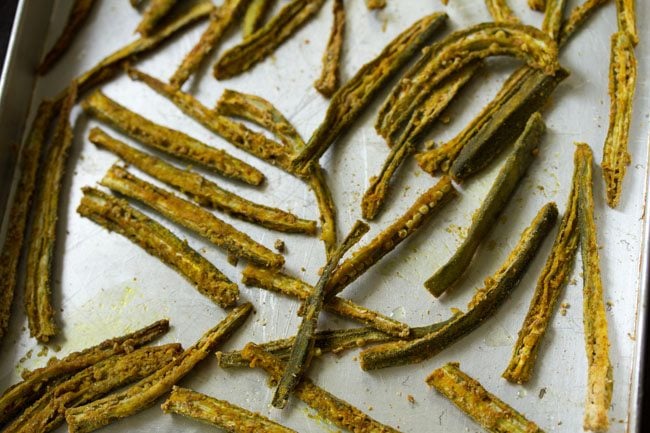 baked kurkuri bhindi on baking tray.