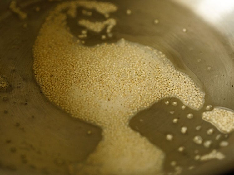 poppy seeds frying in ghee