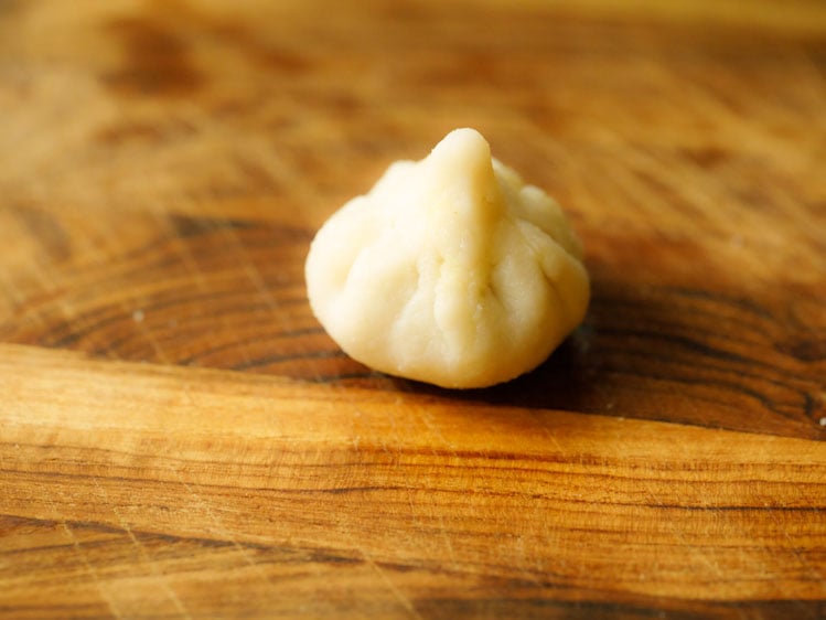 edges joined at the center and modak is shaped