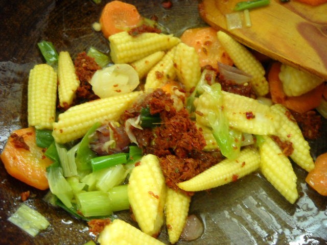 adding-Thai-red-curry-paste