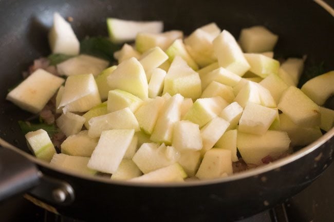 chopped ash gourd added to the pan. 