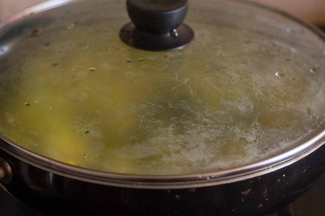 cooking ash gourd in the covered pan. 