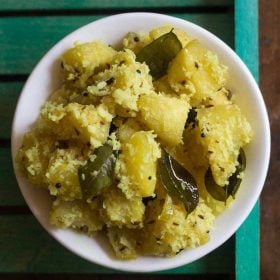 ash gourd thoran served in a white bowl.