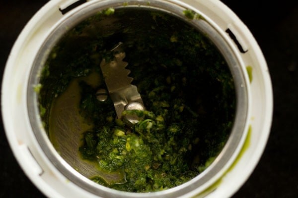 green paste in the grinder jar