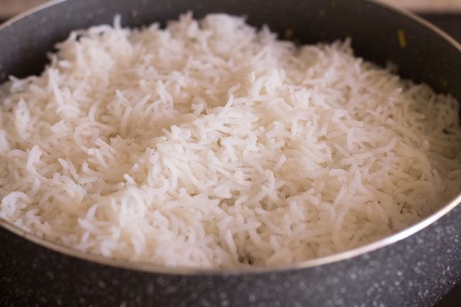 cooked rice added to mushrooms