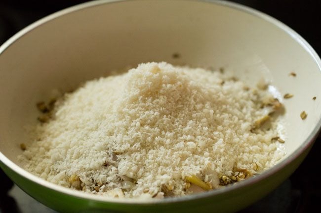 desiccated coconut added to the pan