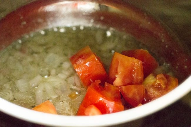 translucent onions and chopped tomatoes