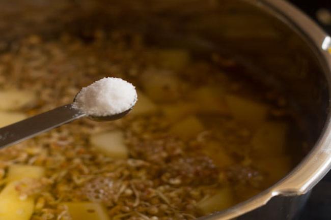 salt added to pressure cooker