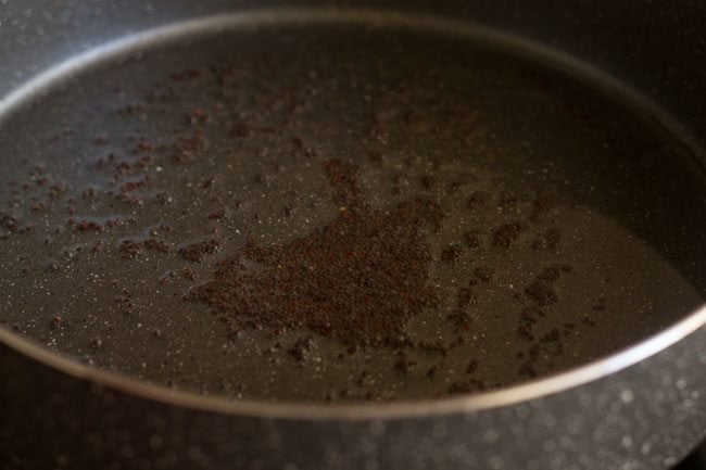 mustard seeds in pan