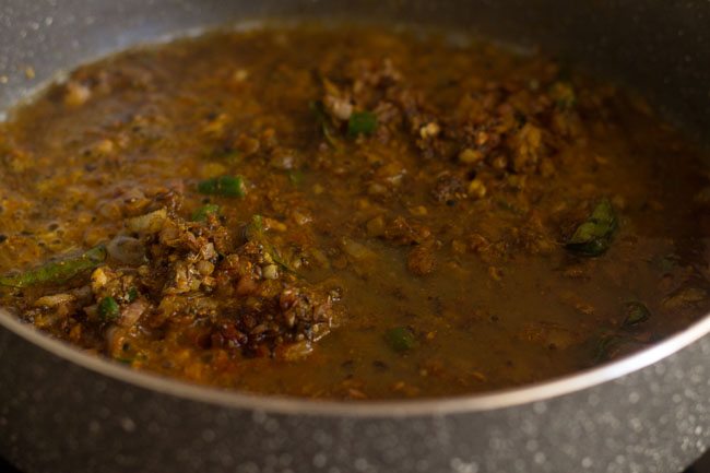 simmer till raw aroma of tamarind goes away