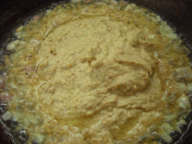 adding masala for bharli vangi