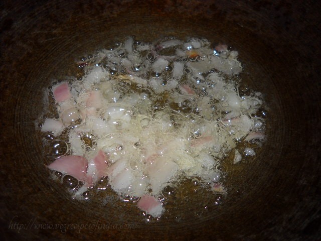 frying onions for bharli vangi