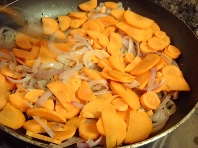 adding-carrots adding carrots to borscht soup recipe