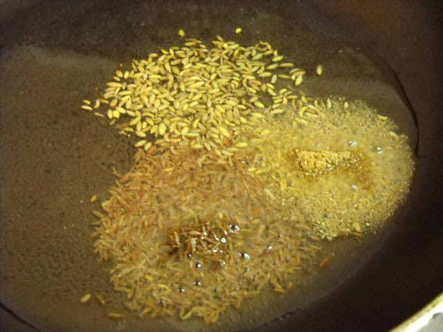 frying-Indian-spices frying Indian spices for borscht soup recipe