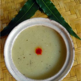 bottle gourd soup served in a white bowl.