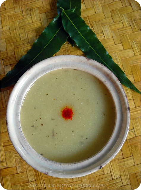 bottle gourd soup served in a white bowl.