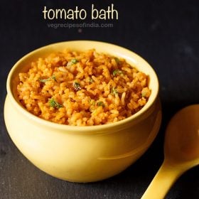 tomato bath garnished with coriander leaves and served in a yellow bowl with a spoon kept in the background and text layover.
