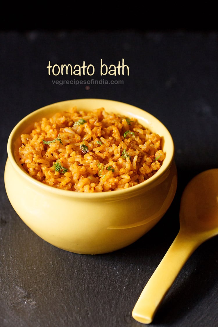 tomato bath garnished with coriander leaves and served in a yellow bowl with a spoon kept in the background and text layover.