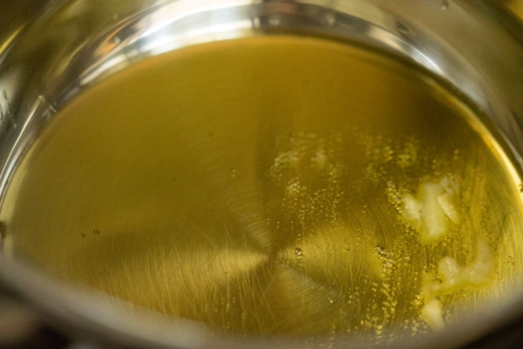 heating ghee or oil in a pan