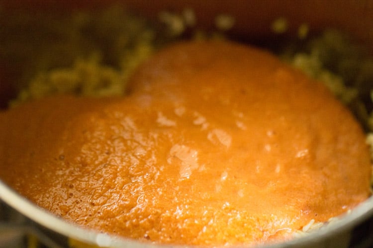 tomato coconut masala paste added to rice