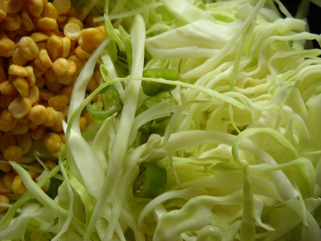 adding green chilies to cabbage upkari recipe