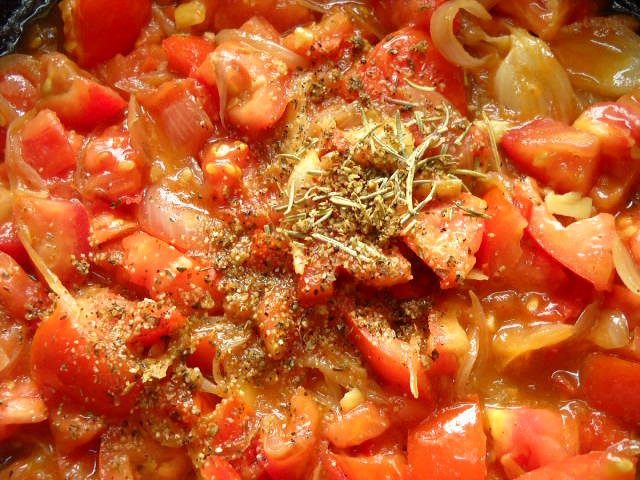 dried herbs added to the tomatoes. 